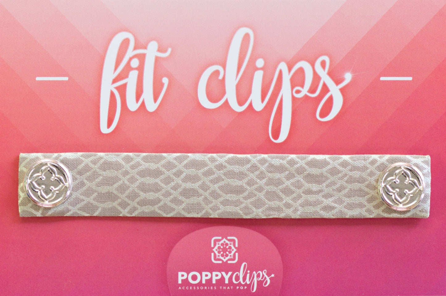 5 ¼” long by 7/8” wide cream colored material with a lighter colored interlocking weave pattern, and magnets at each end. The outer magnets are a decorative silver medallion with the company logo.
