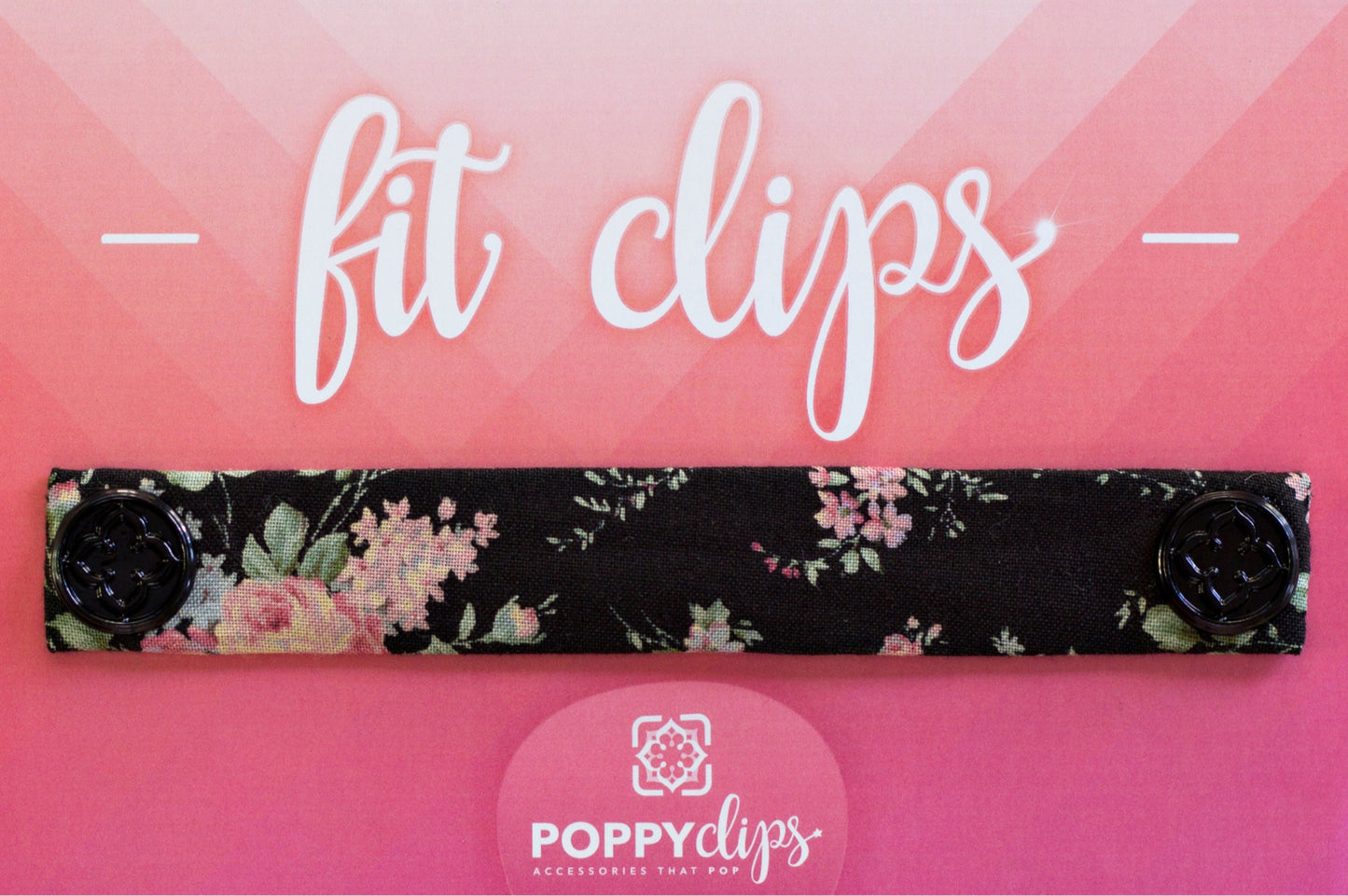 5 ¼” long by 7/8” wide black material with a vintage rose floral pattern in pink and green, and magnets at each end. The outer magnets are a decorative black medallion with the company logo.