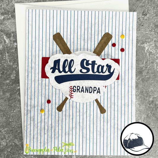A handmade Father's Day card with a baseball theme. The card features a baseball, crossed bats, and the words "All Star Grandpa" in bold script. The background is a textured white with blue stripes. A small baseball cap stamp is Located in the Twelve Bridges area (off Eastridge).  Cross posting. inside.
