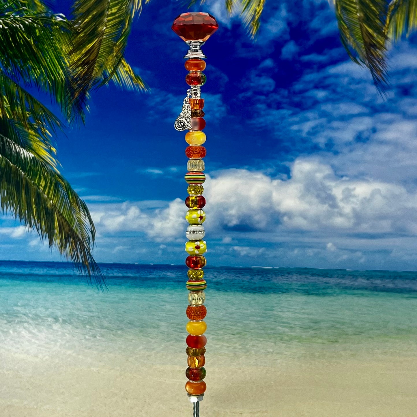 Orange citrus sunrise kitty garden stake — metal yard décor with a playful cat silhouette.