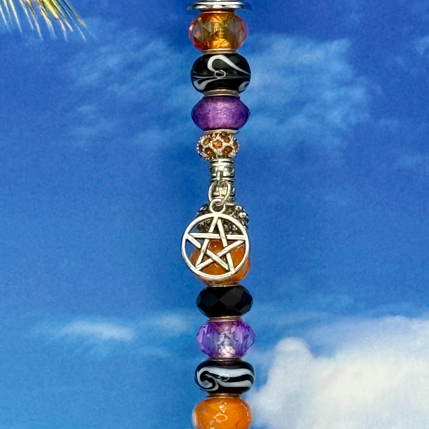 Metal garden stake with a pentagram design and ‘Hexed & Blessed’ inscription — mystical and witchy outdoor décor.
