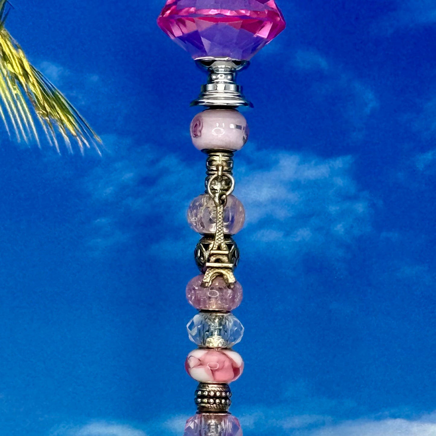 Metal garden stake with Eiffel Tower design and ‘Parisian Dreams’ inscription — romantic outdoor décor.