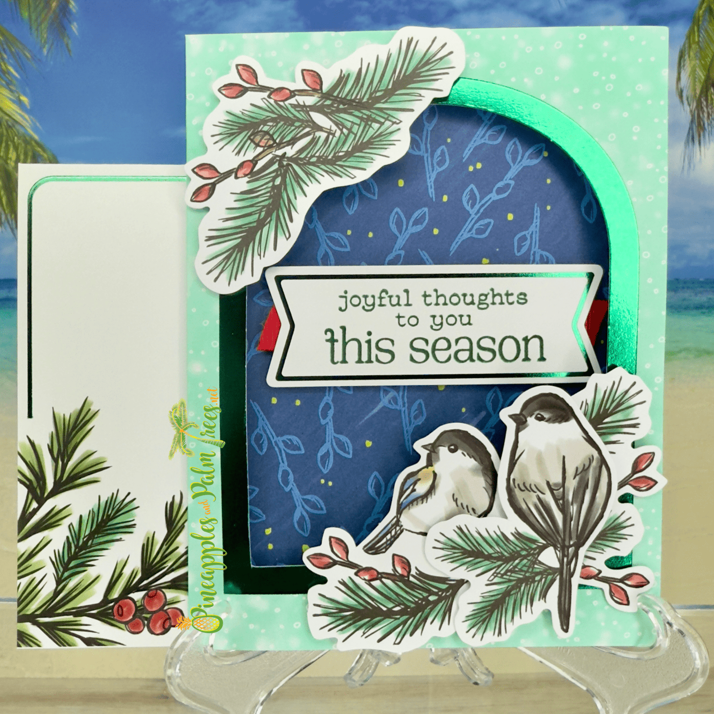 Holiday greeting card with the message ‘Joyful Thoughts to You This Season,’ illustrated with small birds and seasonal foliage.
