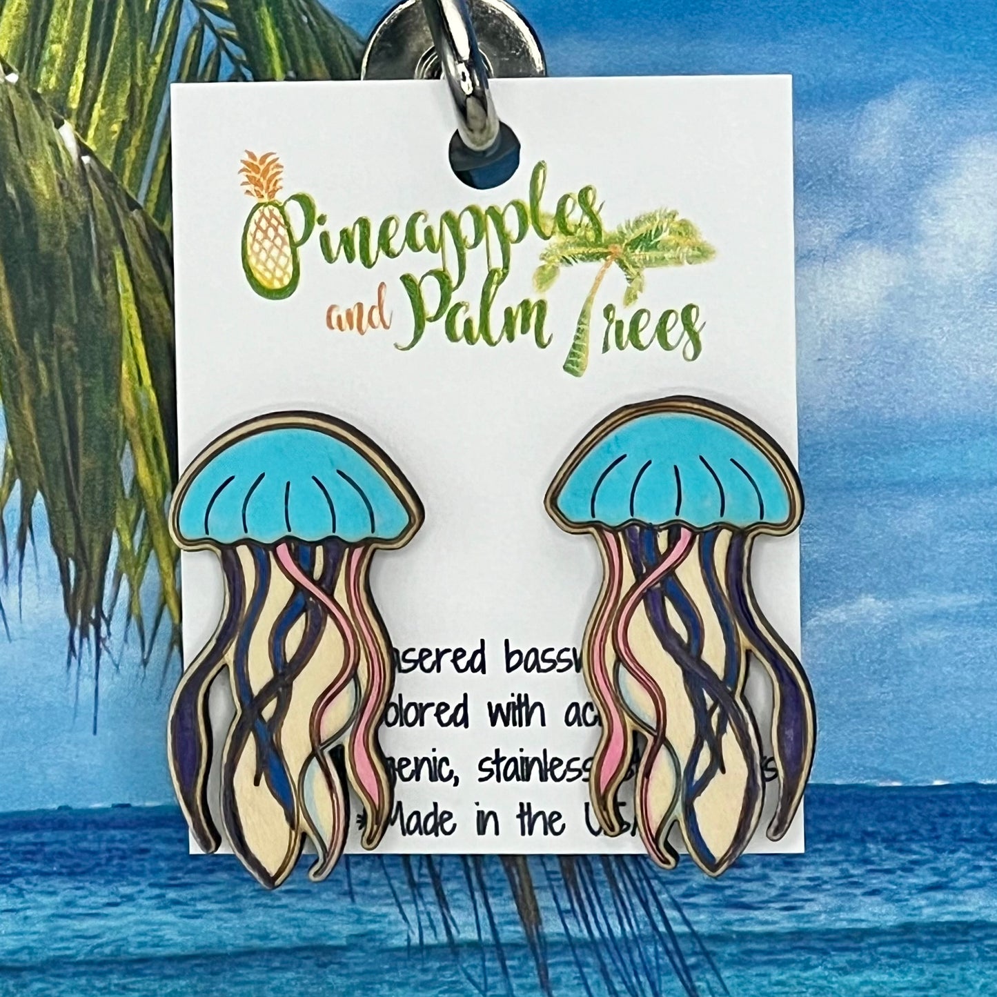 Lasered jellyfish stud earrings with ocean-inspired design, perfect for gifting or everyday wear.