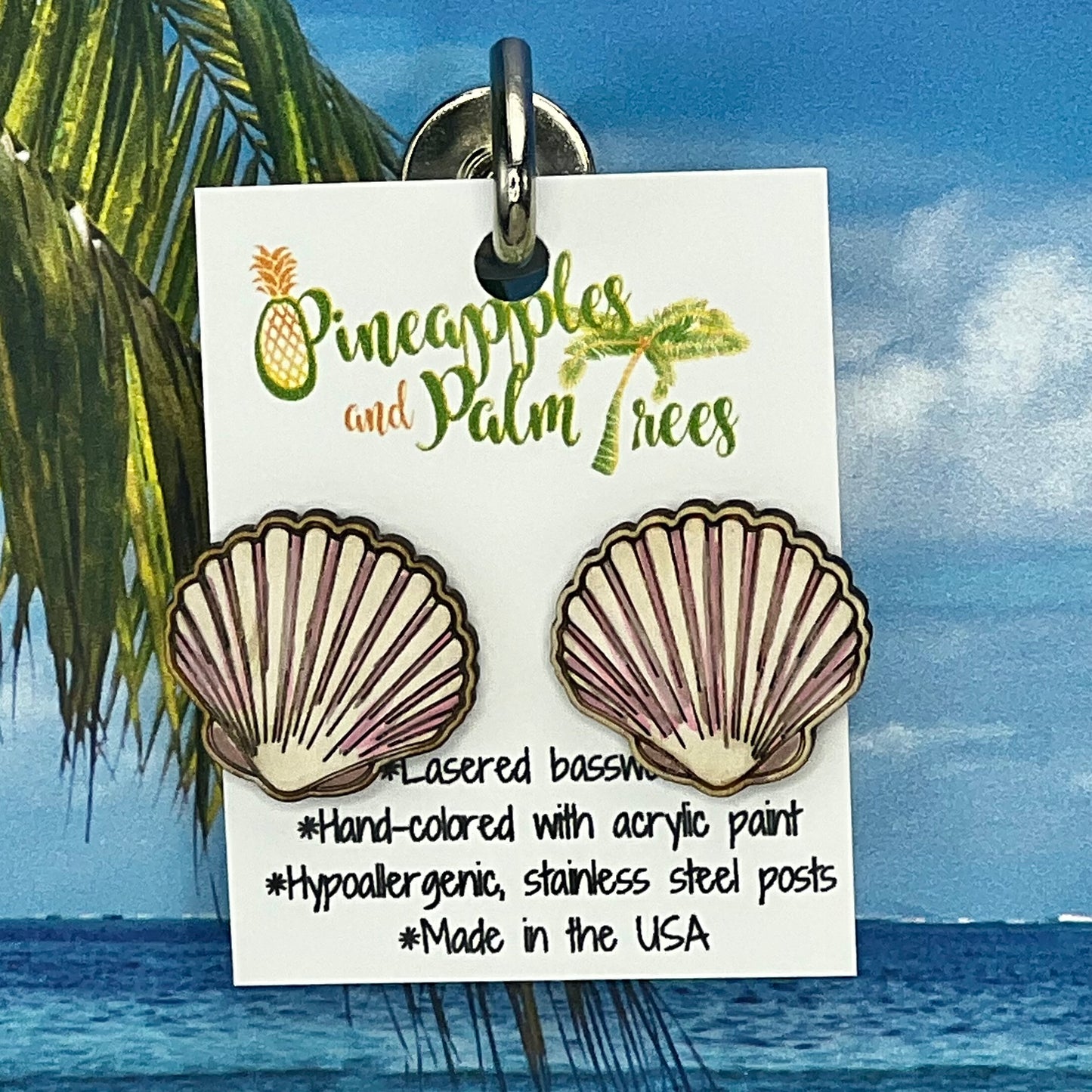 Lasered scallop shell stud earrings with ocean-inspired design, perfect for gifting or everyday wear.