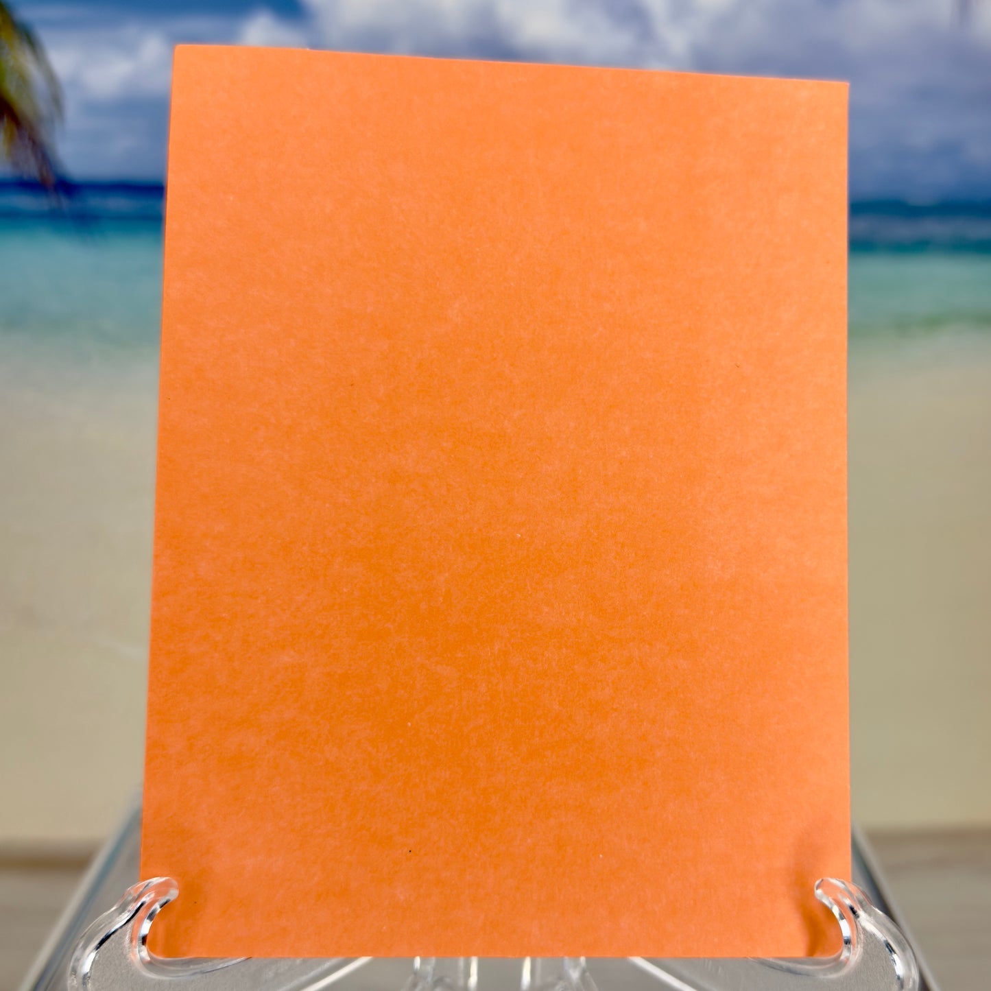 Back of greeting card “May the good you do come back to you” showing blank reverse side.