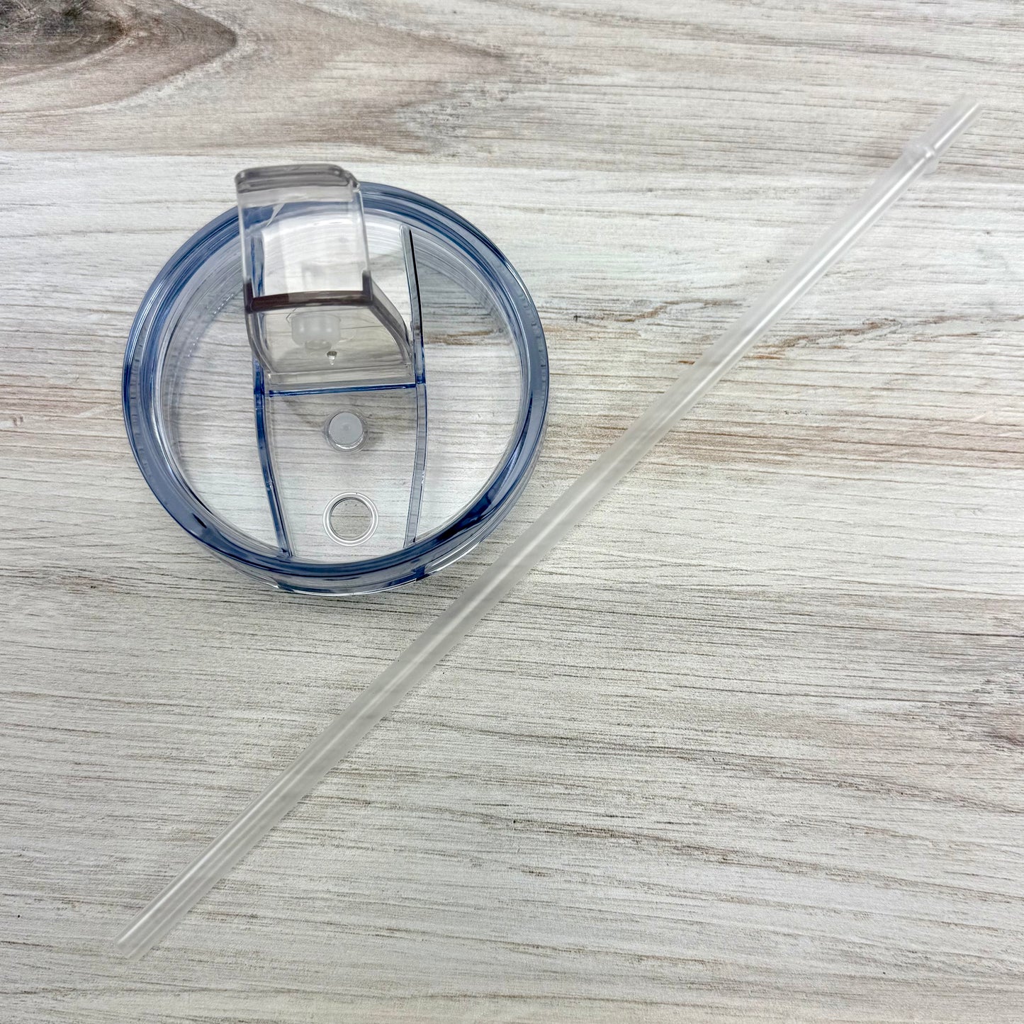 Stainless steel tumbler cover and straw for tumbler.