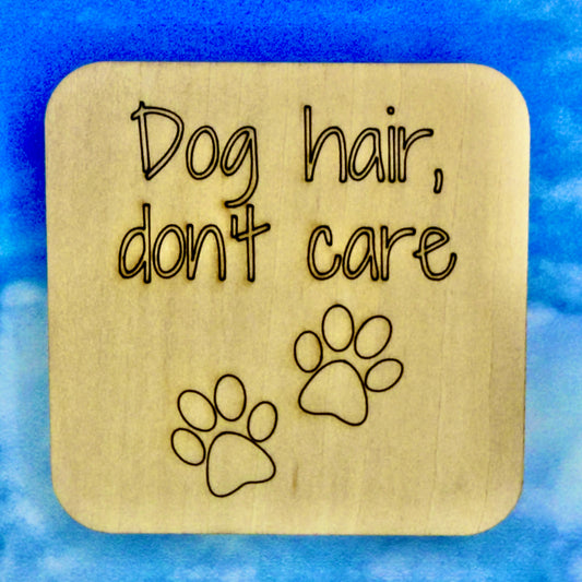 2.5" basewood square with “A house is not a home without a dog“ laser engraved text with image of dog paws.