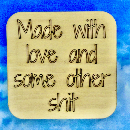 2.5" basewood square with “Made with love and some other shit“ laser engraved text.