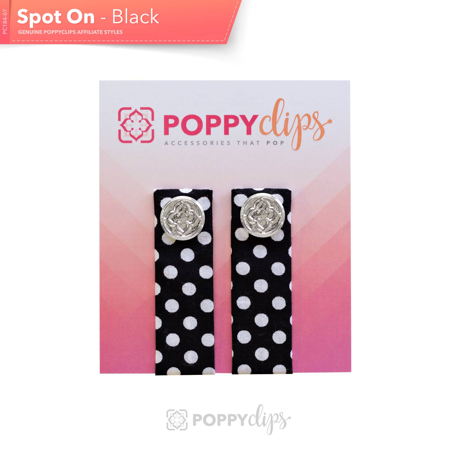 Two 5 ¼” long by 7/8” wide black material with white polka dots, and a magnet at each end.  The outer magnet is a decorative silver medallion with the company logo. 