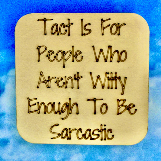 2.5" basewood square with “Tact is for people who aren't witty enough to be sarcastic“ laser engraved text.