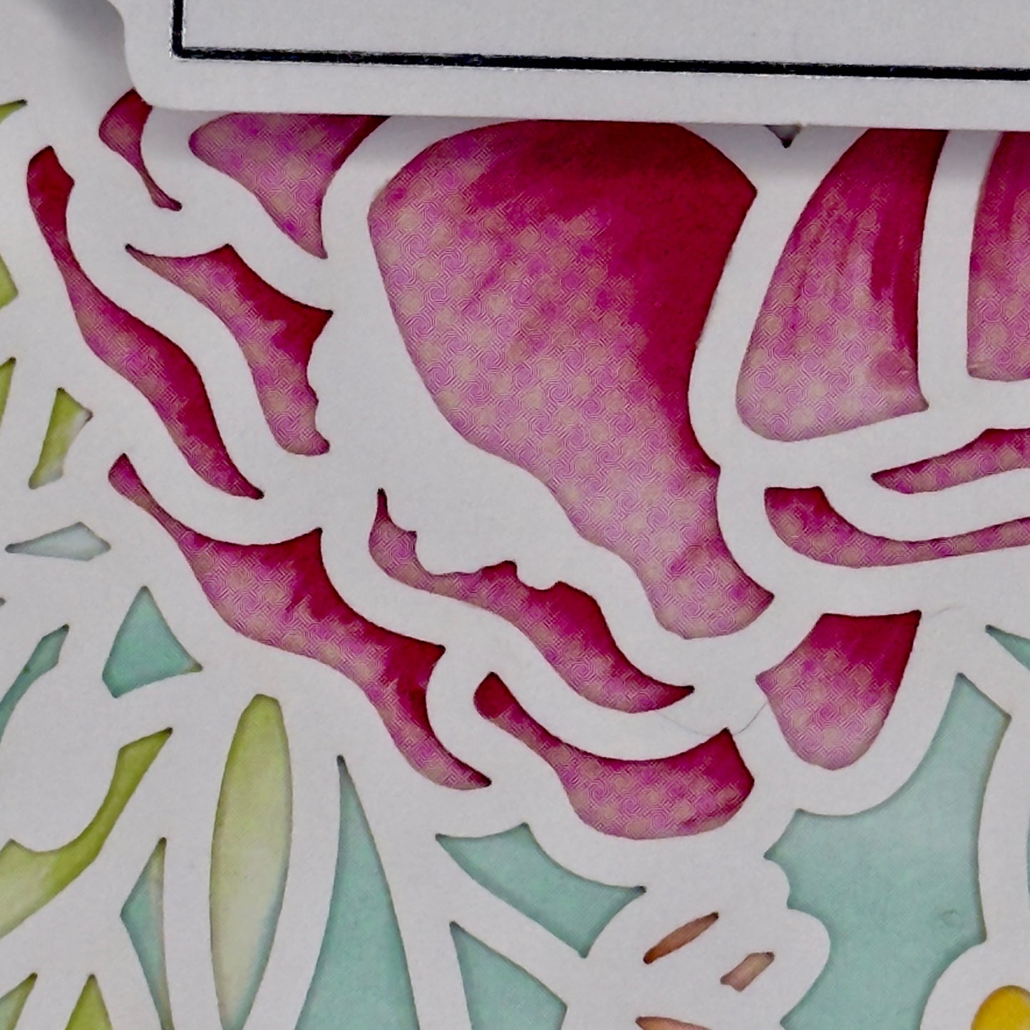 Floral details of a greeting card and the message “Grateful for the everyday magic of you” from Pineapples and Palm Trees