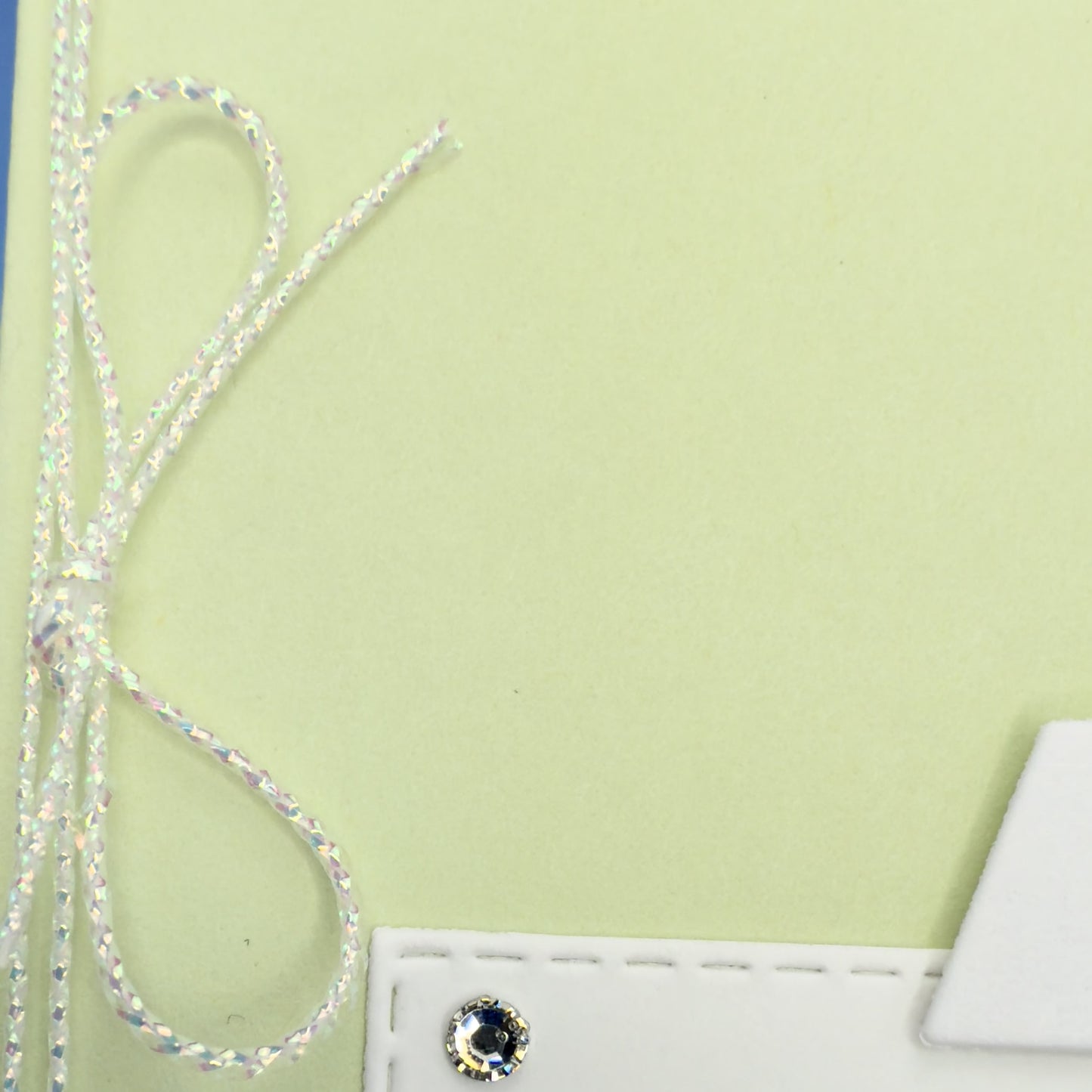 Hand-crafted greeting card in green and lavender hues with the message ‘Happy Mother’s Day,’ shown with its matching envelope — elegant and loving floral design.