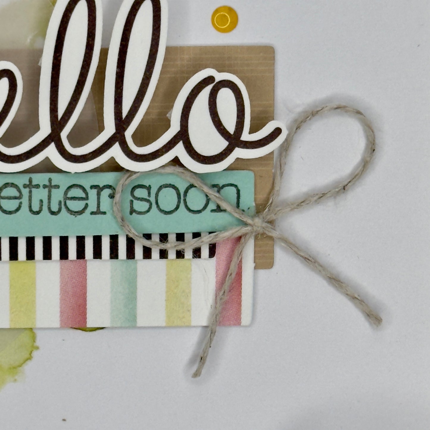 Close‑up of the ‘Hello, Peel Better Soon’ greeting card showing a cute ribbon.