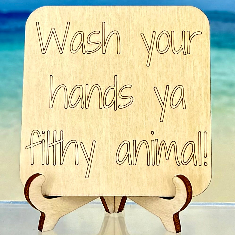 Humorous fridge magnet: ‘Wash your hands ya filthy animal’ — funny bathroom decor / quote magnet.