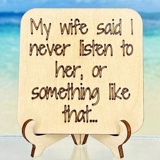 Wood‑style fridge magnet: ‘My wife said I never listen to her … or something like that’ — funny relationship quote.