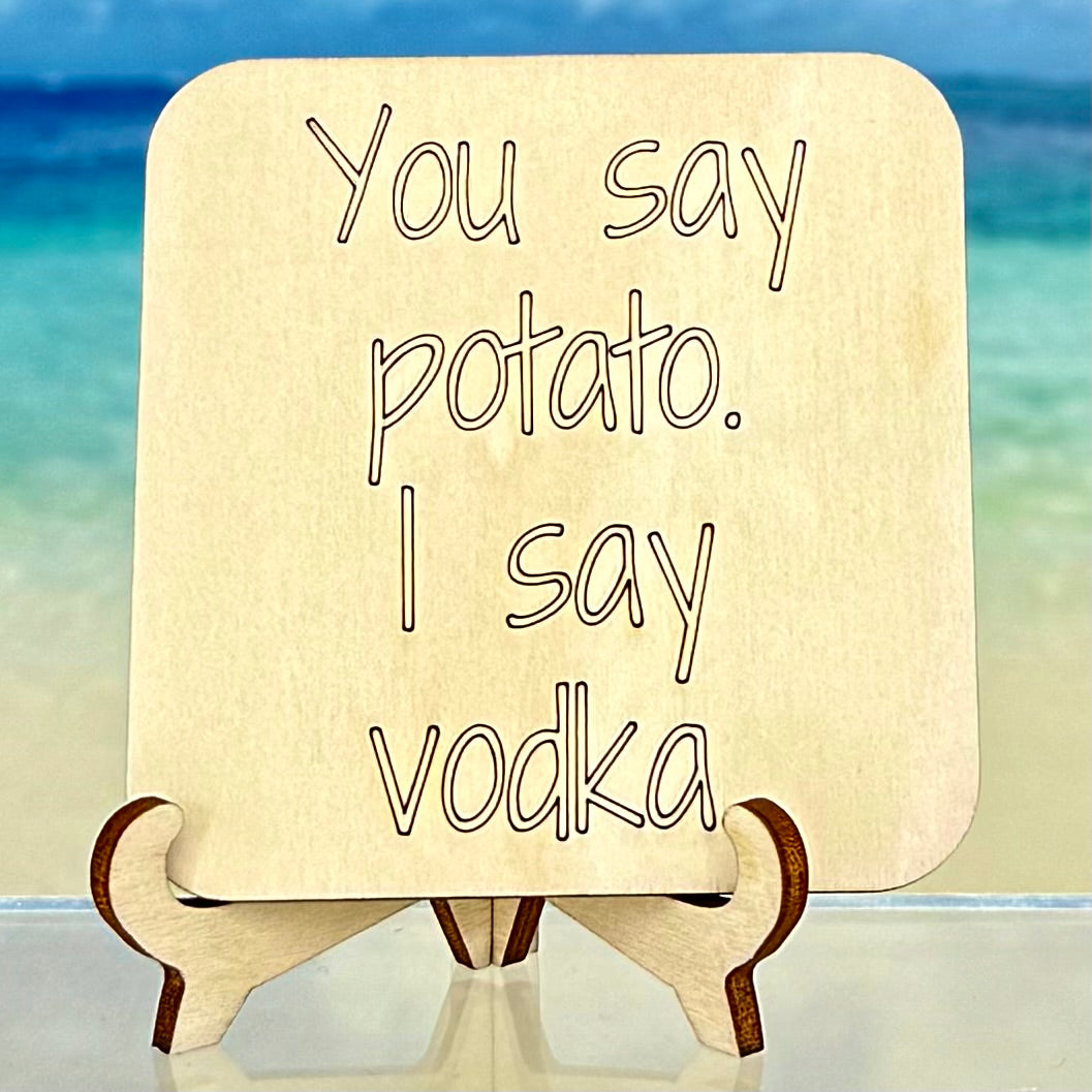 Fridge magnet: ‘You say potato, I say vodka’ — humorous drink‑lover quote.