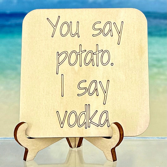 Fridge magnet: ‘You say potato, I say vodka’ — humorous drink‑lover quote.