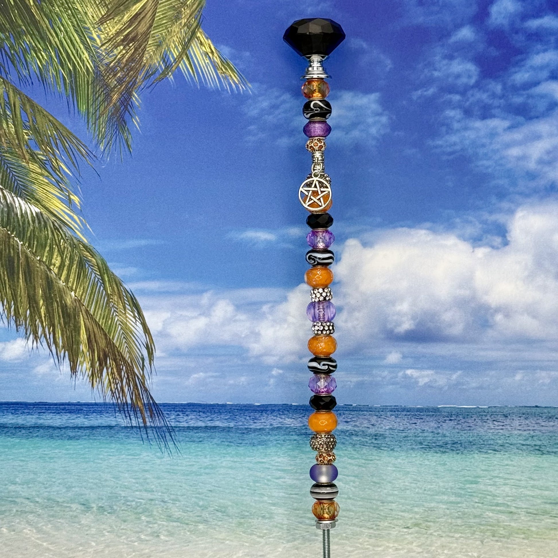 Metal garden stake with a pentagram design and ‘Hexed & Blessed’ inscription — mystical and witchy outdoor décor.
