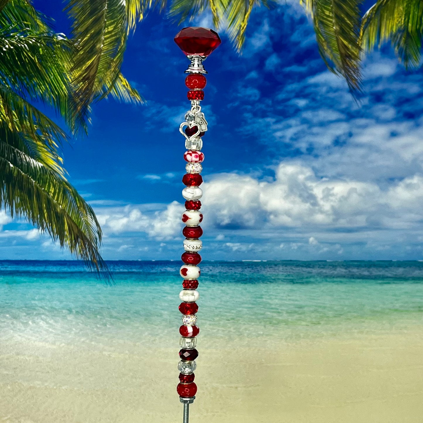 Red metal garden stake with a heart and nurse’s cross — ‘Scarlet Heart Healer’ faith-inspired décor.