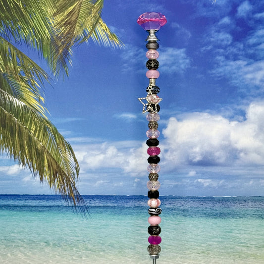 Black and pink metal garden stake ‘Twilight Fairy Stardust’ with whimsical fairy design — enchanting outdoor décor.
