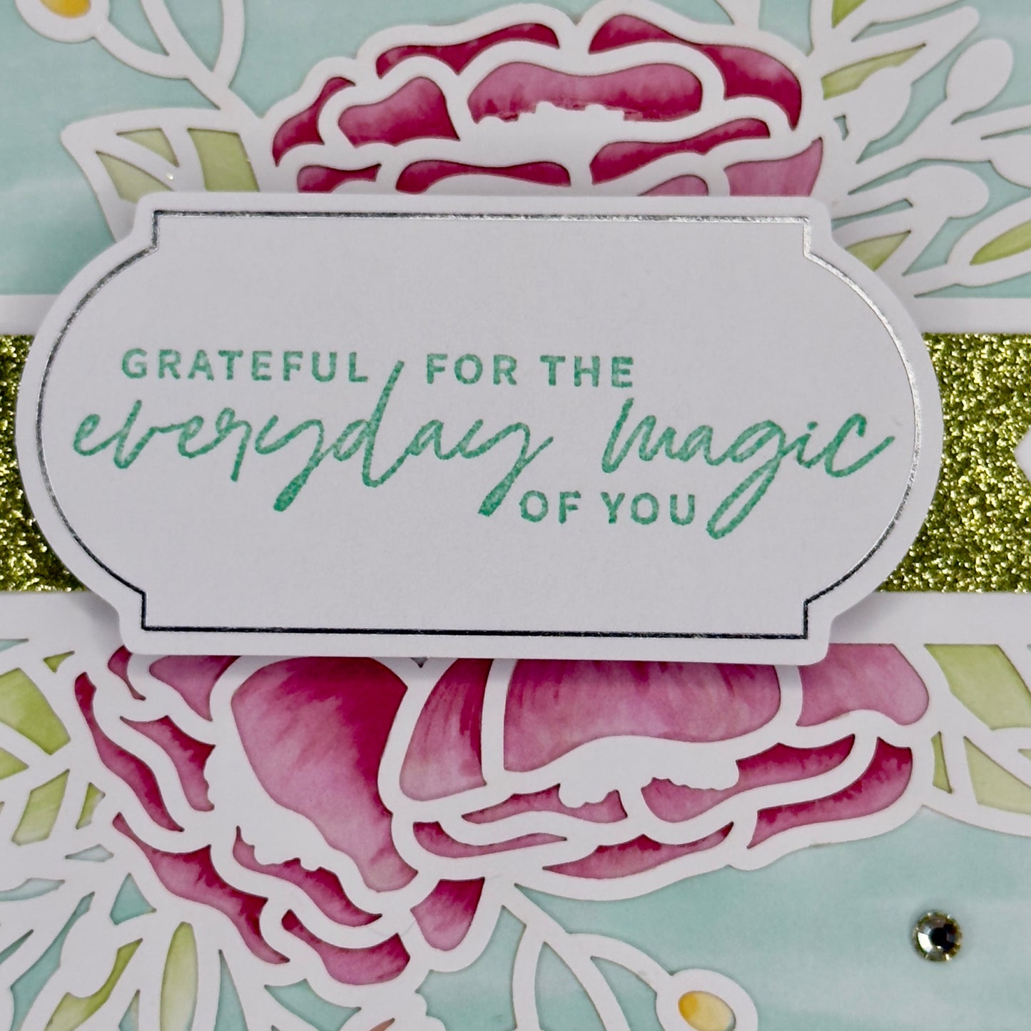 Greeting card with floral illustrations and the message “Grateful for the everyday magic of you” from Pineapples and Palm Trees