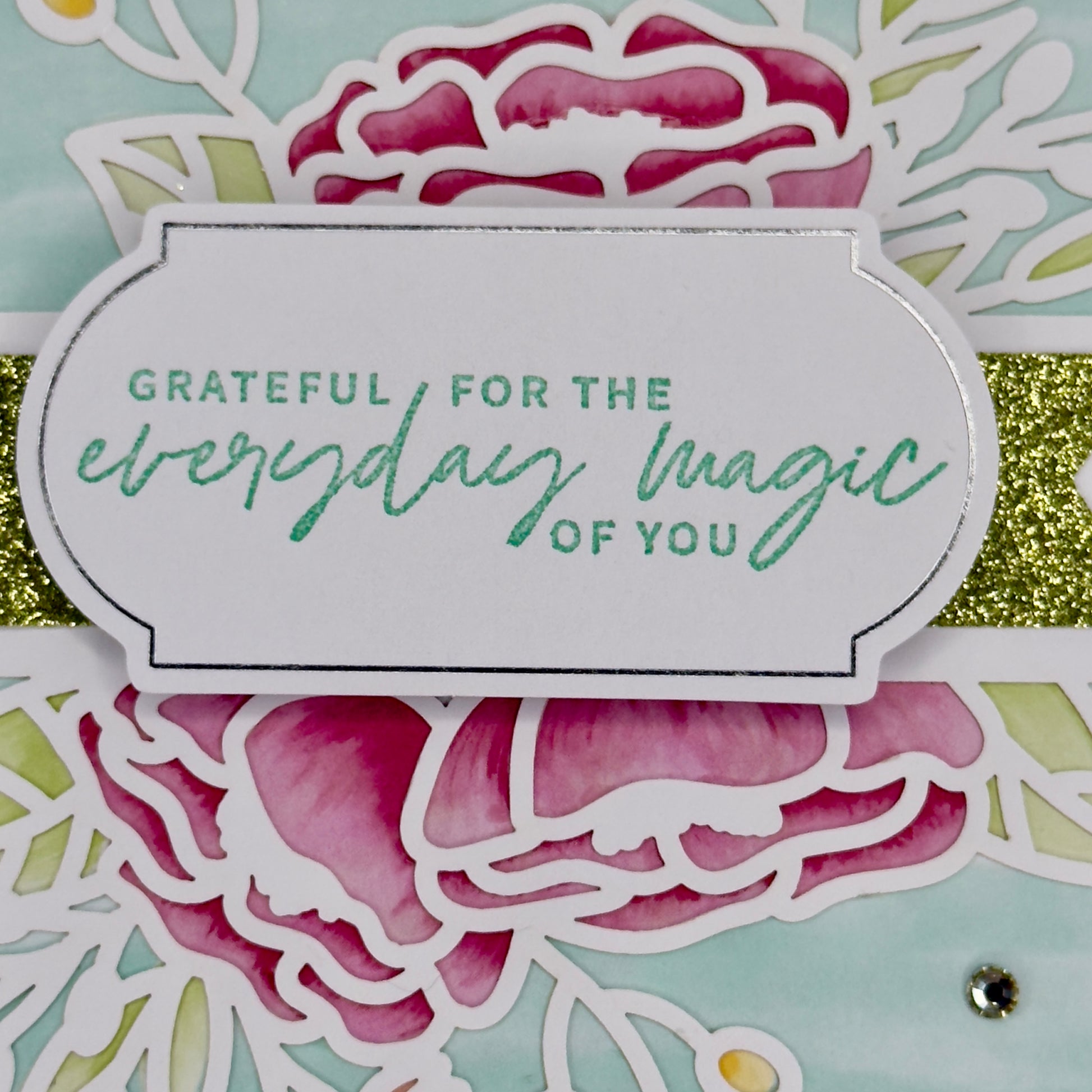 Greeting card with floral illustrations and the message “Grateful for the everyday magic of you” from Pineapples and Palm Trees