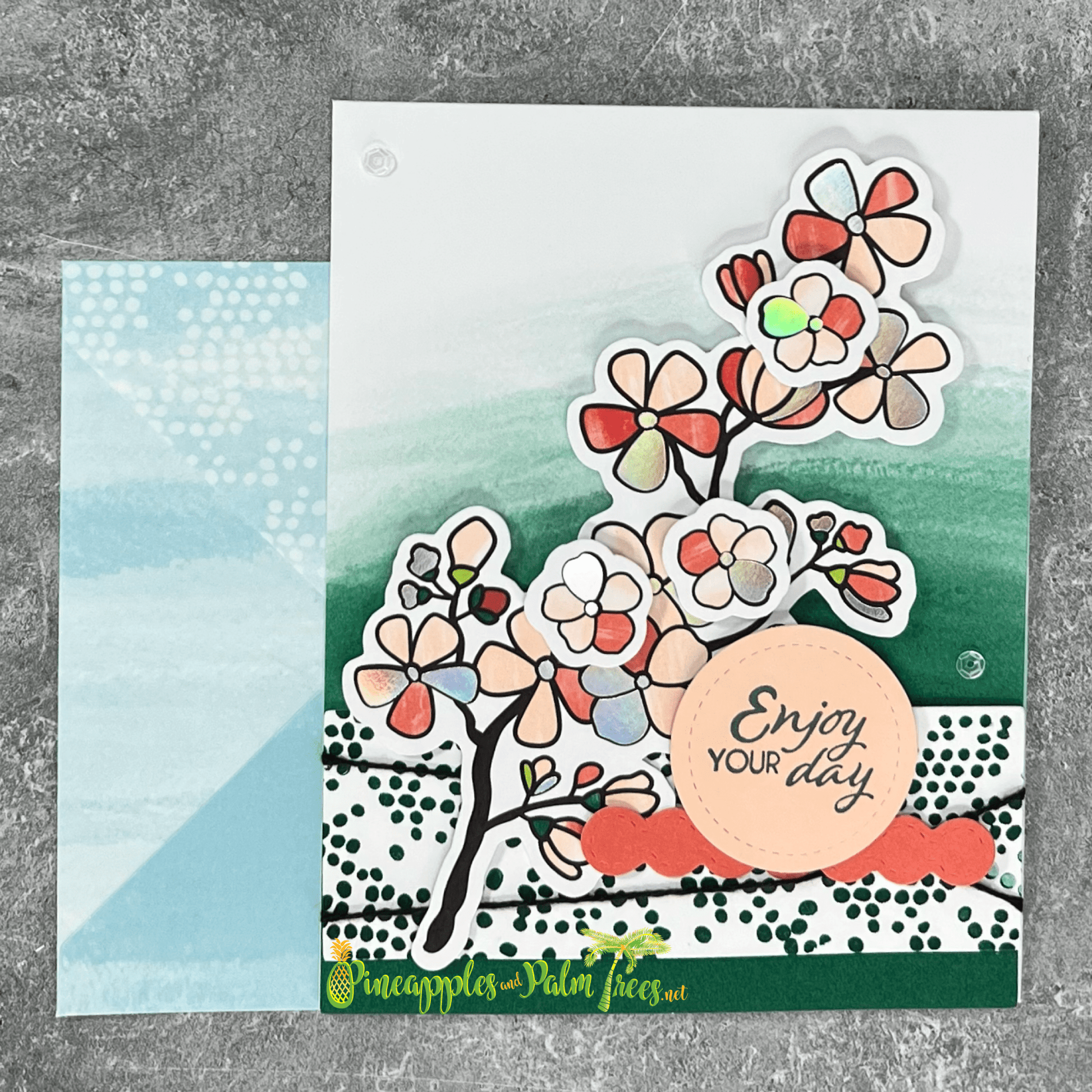 Enjoy Your Day greeting card featuring illustrated pinwheel-style flowers in soft pastels.
