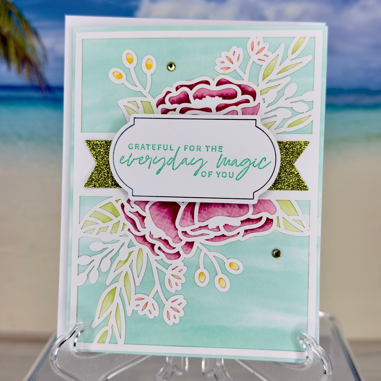 Greeting card with floral illustrations and the message “Grateful for the everyday magic of you” from Pineapples and Palm Trees