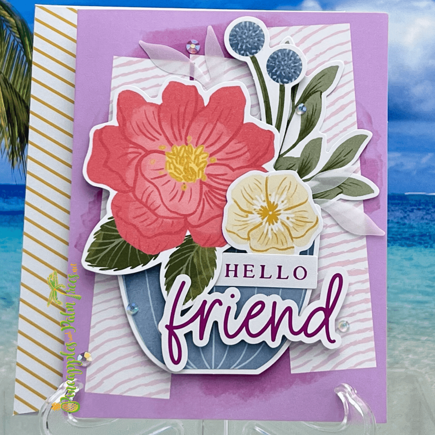 Purple greeting card with the words ‘Hello Friend’ in white script, shown with its matching envelope — a warm and friendly design.