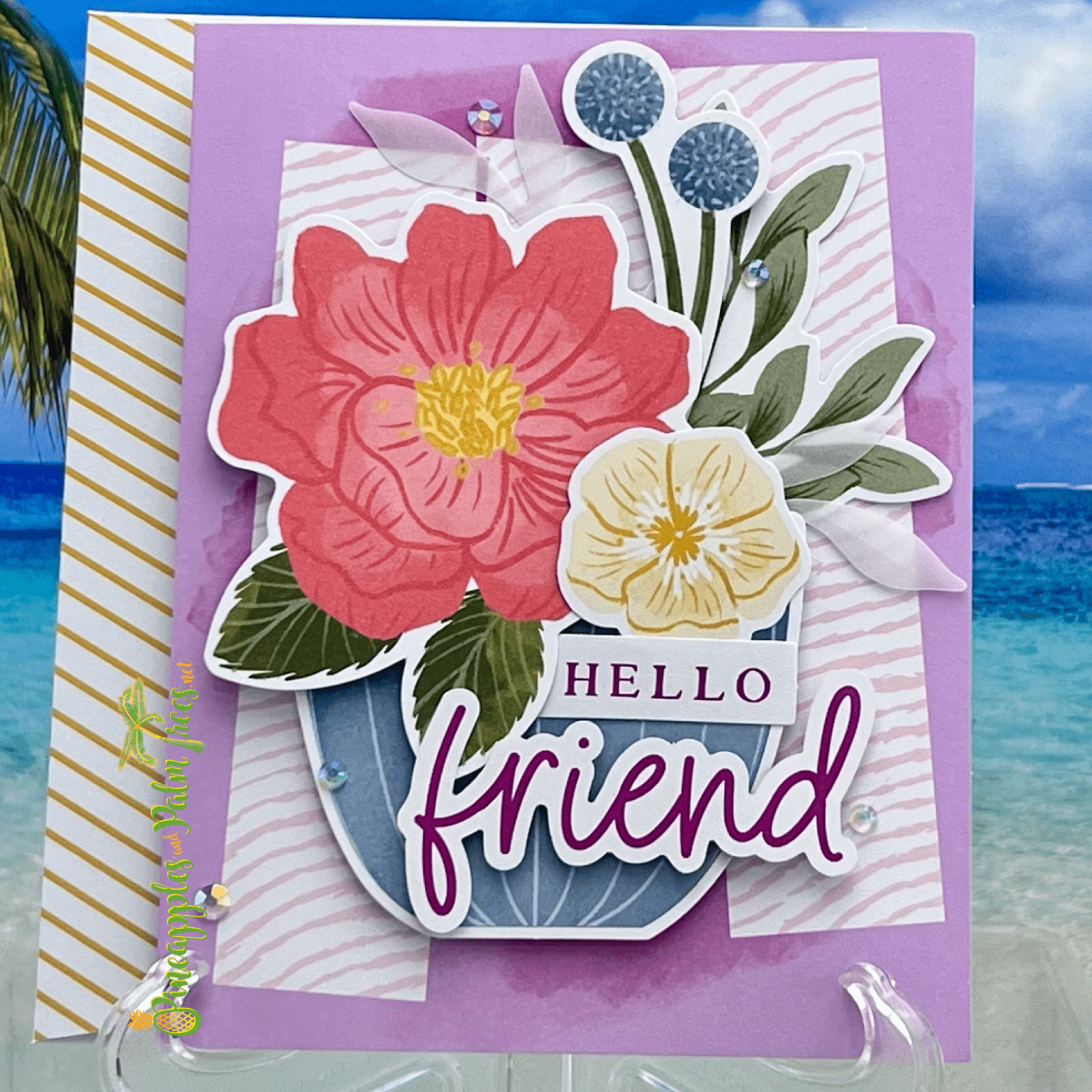 Purple greeting card with the words ‘Hello Friend’ in white script, shown with its matching envelope — a warm and friendly design.