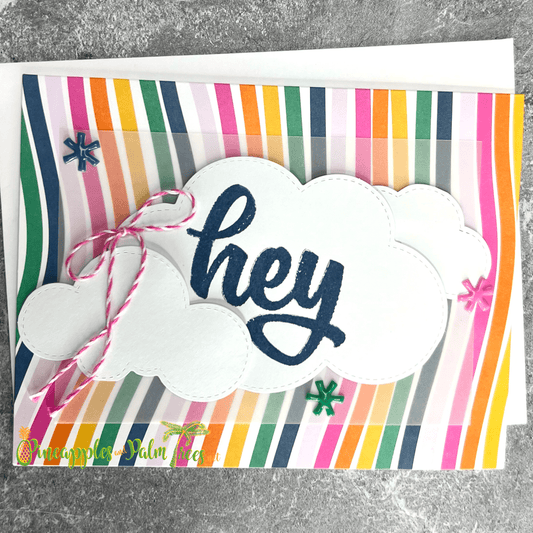 Greeting card with the words ‘Hey’ in a cloud, shown with its matching envelope — cheerful and crafted for sending sunny vibes.