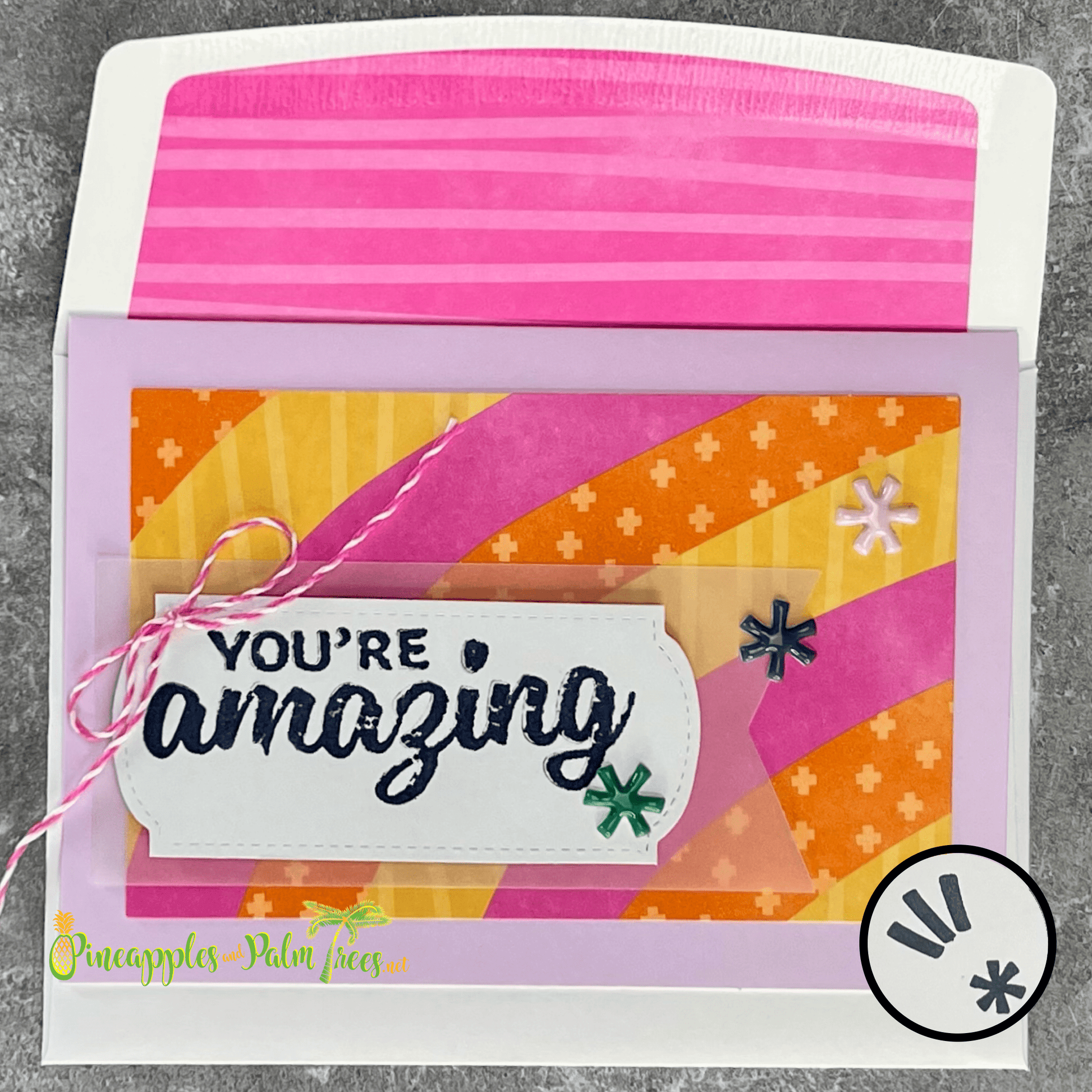 Bright rainbow-themed greeting card reading ‘You’re Amazing’ on the front, shown  — cheerful and uplifting design for someone special.