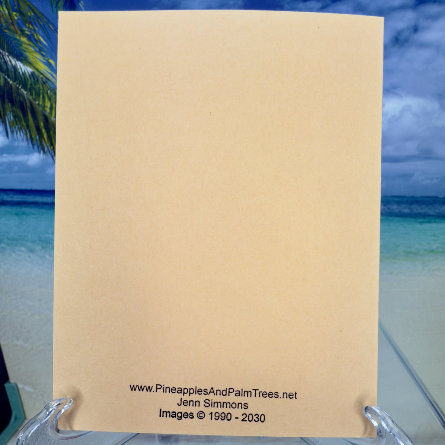 Soft peach greeting card with elegant lettering that says ‘Happy Mother’s Day,’ shown with its matching envelope — a heartfelt and handcrafted card for mom.

