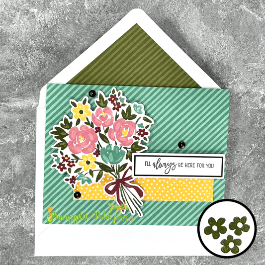 Greeting card with the message ‘I’ll always be here for you’ surrounded by a bouquet of flowers, displayed with its matching envelope — heartfelt and comforting design.



