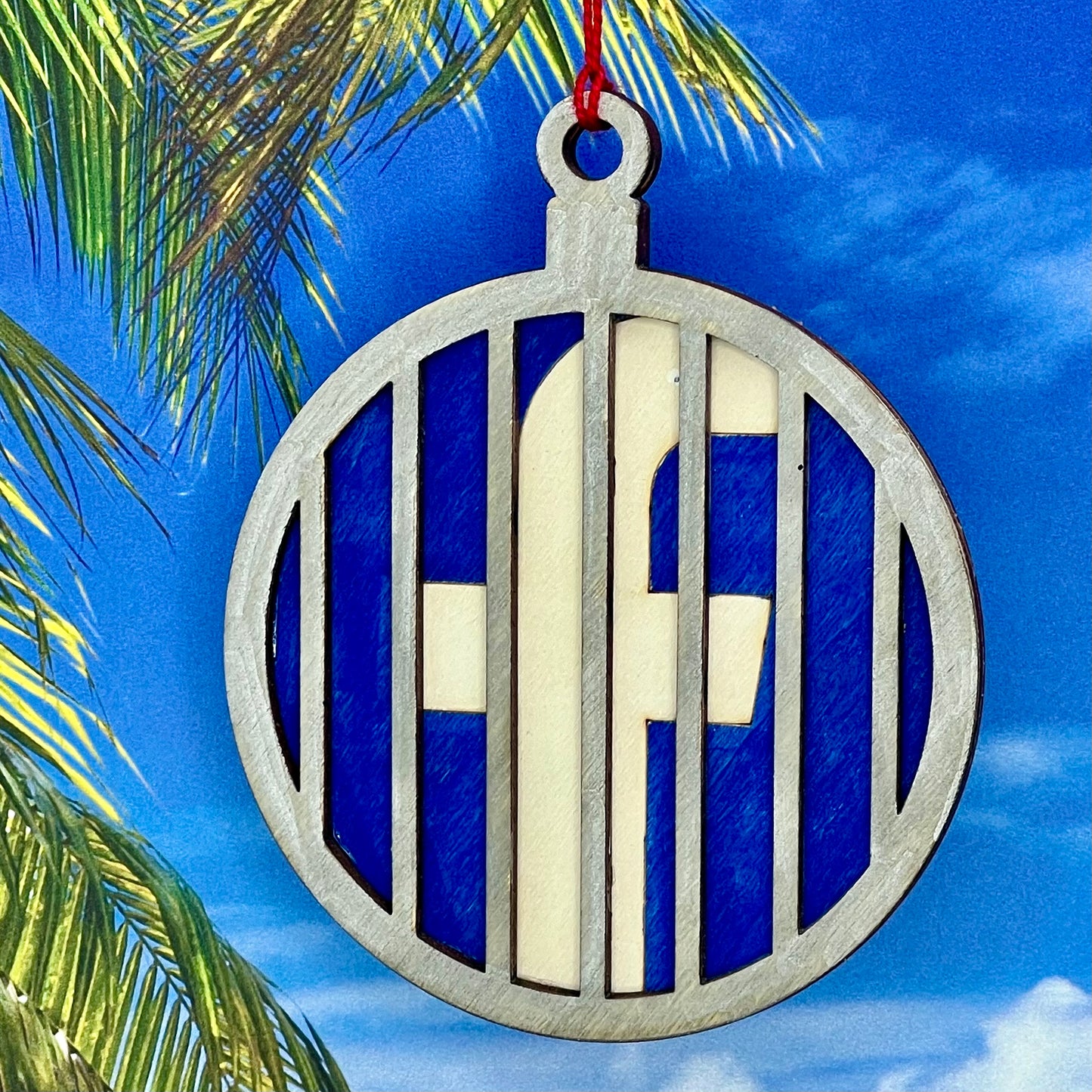Lasered Christmas ornament with humorous “Facebook Jail” design, perfect for holiday gifting or décor.