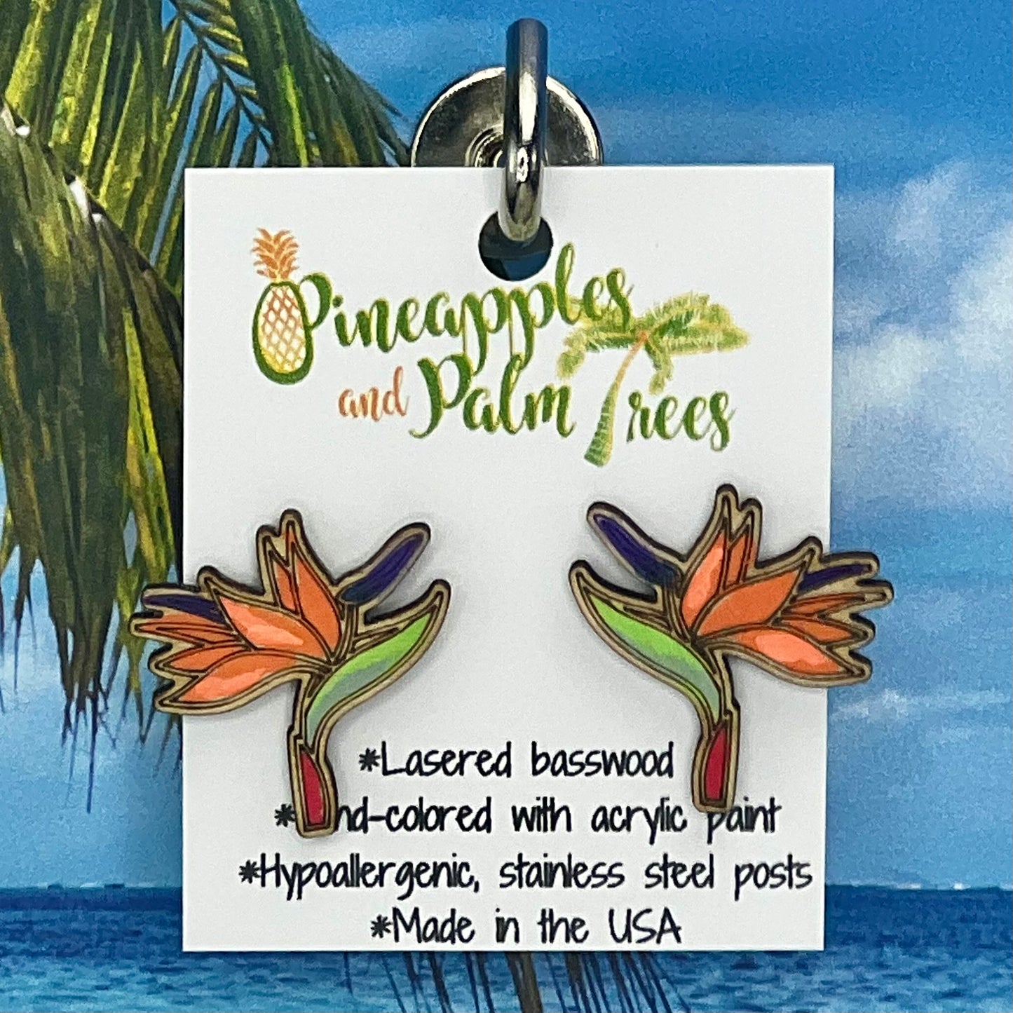 Lasered bird of paradise stud earrings with tropical floral design, perfect for gifting or everyday wear.