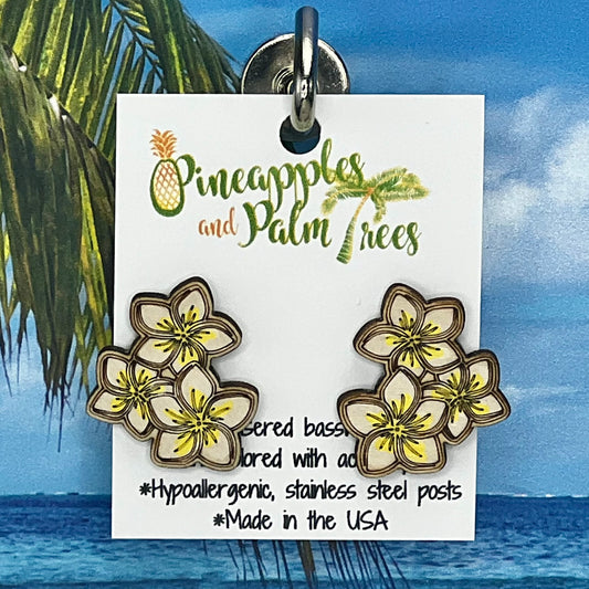 Lasered plumeria trio stud earrings with tropical floral design, perfect for gifting or everyday wear.