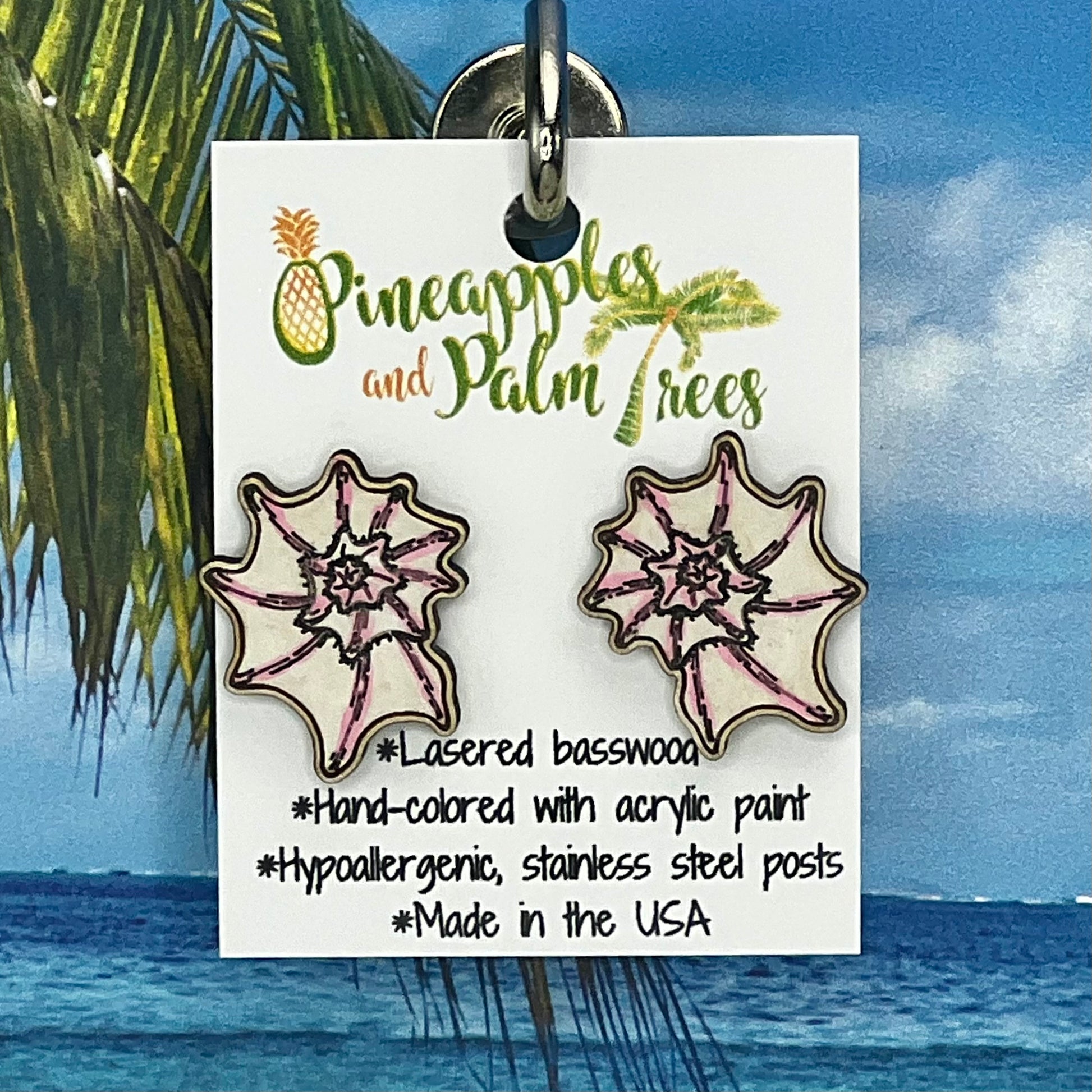 Lasered spiny nautilus stud earrings with ocean-inspired design, perfect for gifting or everyday wear.