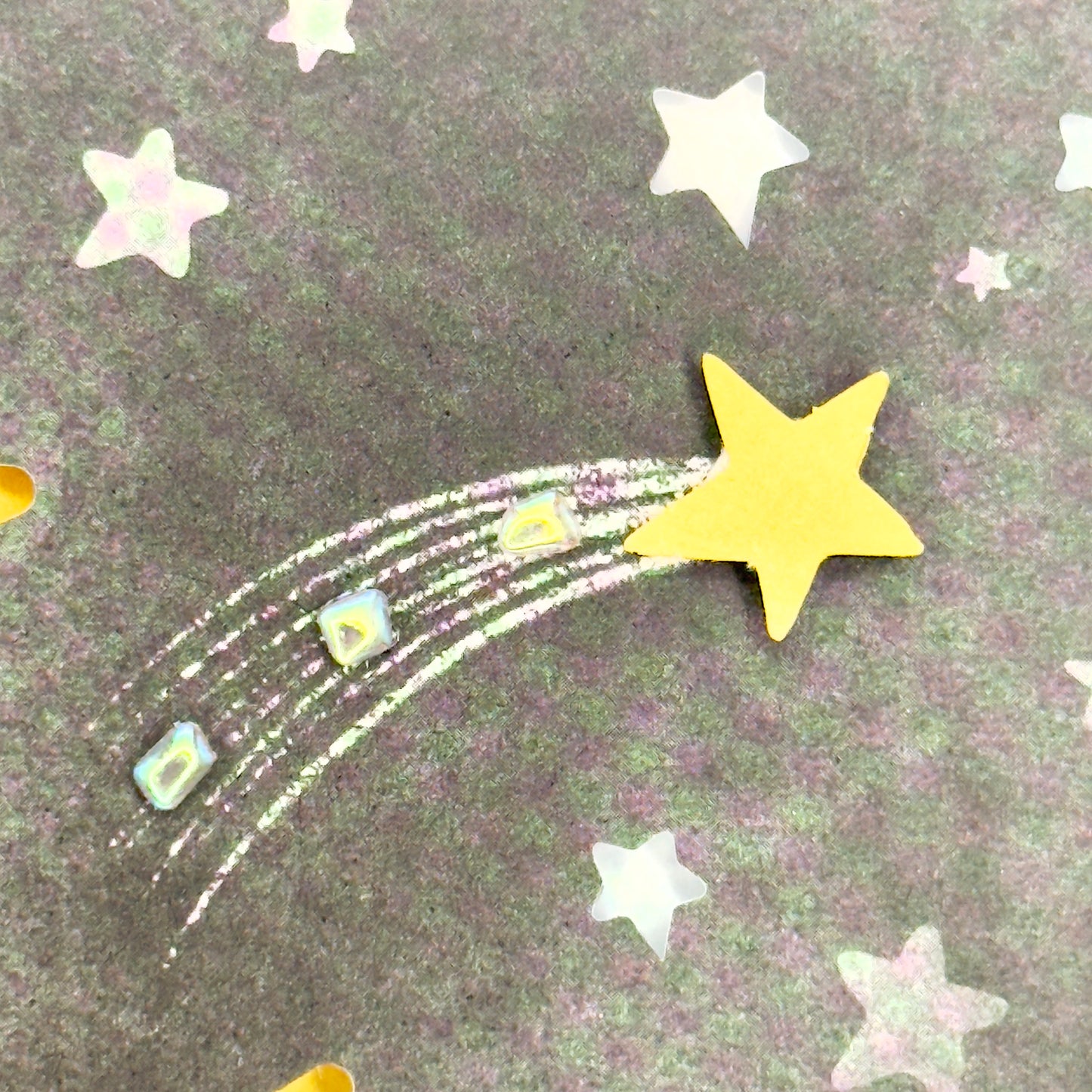 Details of the ‘Every Day Is a New Day’ greeting card featuring stars.