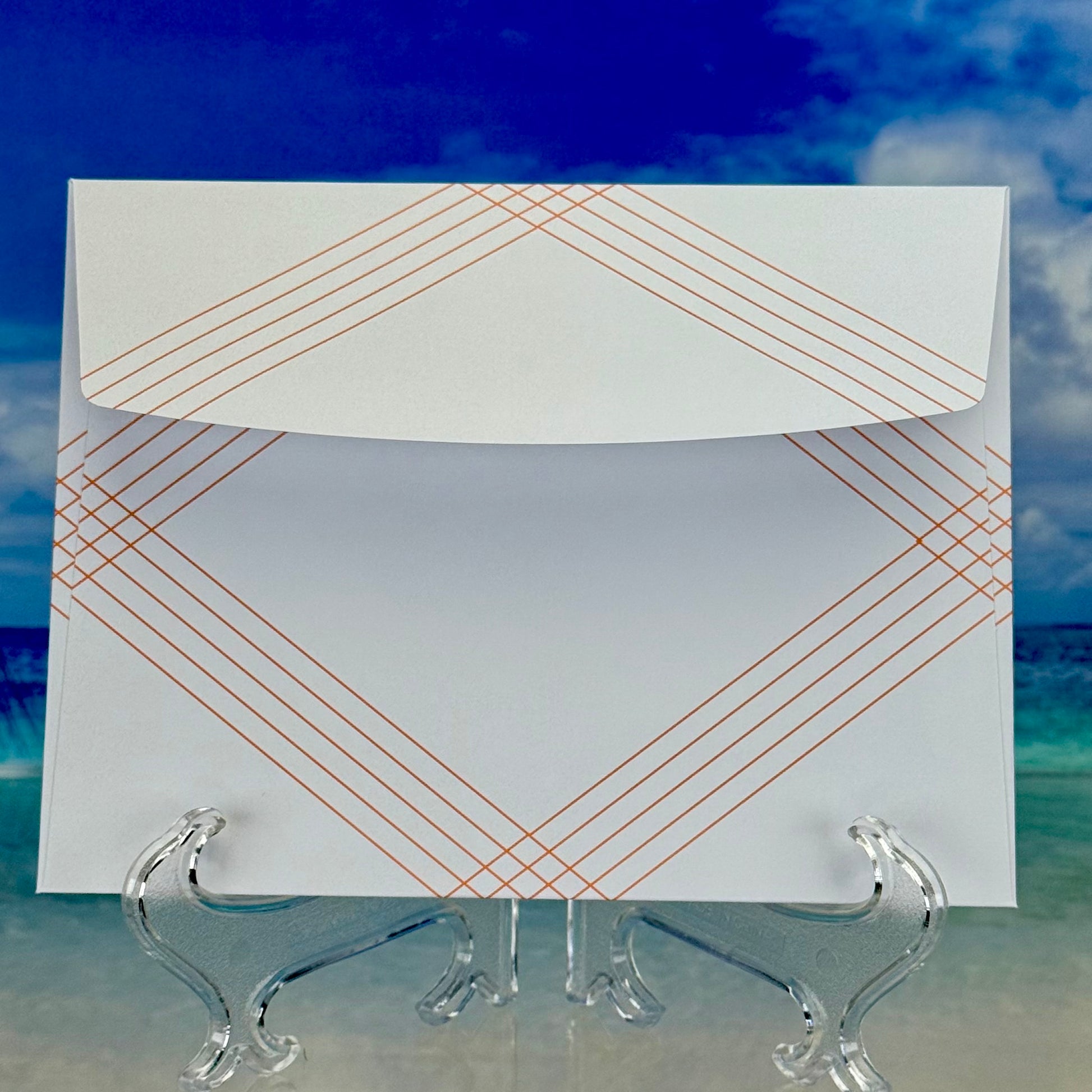 “Miss You” greeting card with matching envelope ready for mailing.