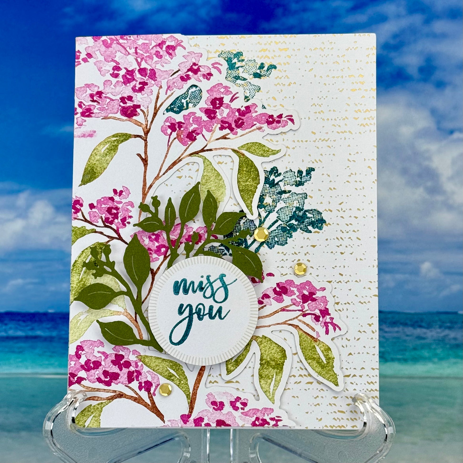 Handcrafted “Miss You” greeting card with floral design on front.