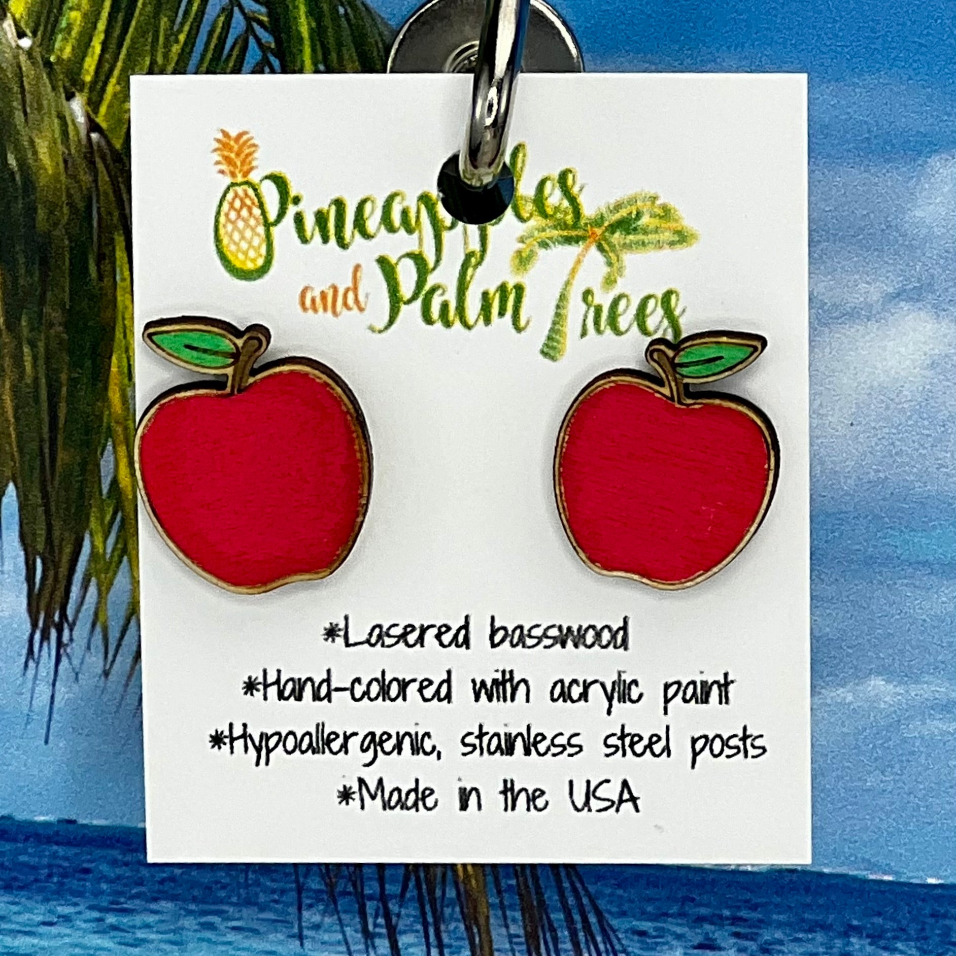 Lasered apple-shaped stud earrings, perfect for casual wear or gifting to fruit lovers.