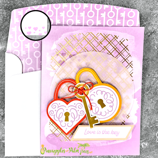 Greeting card “Love Is The Key” showing a purple lock-and-key illustration on front cover.