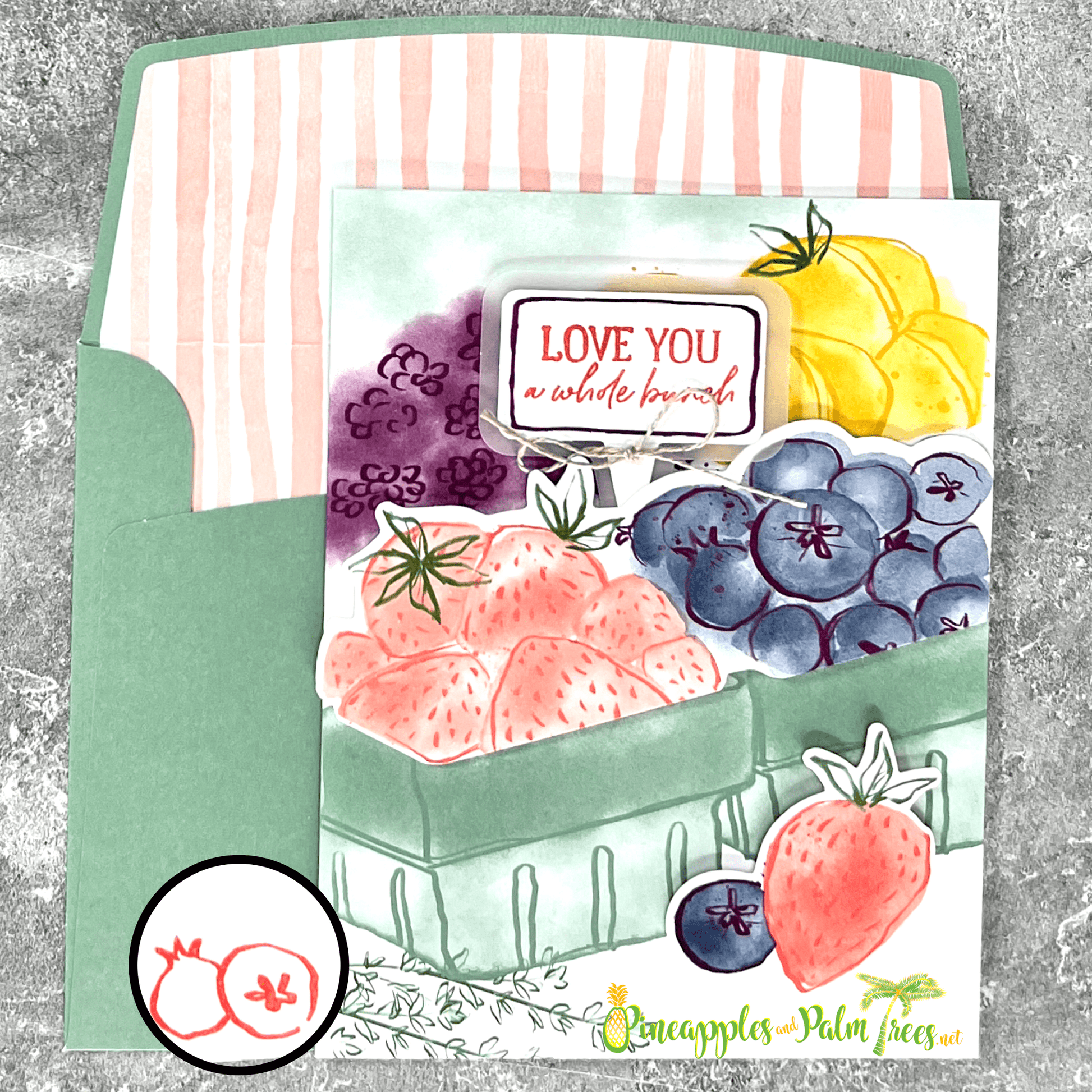 Greeting card “Love You A Whole Bunch” showing colorful fruit illustration on front cover.