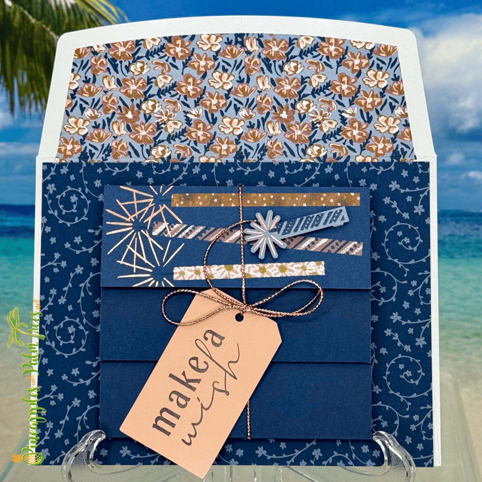 Greeting card with “Make a Wish” text and colorful birthday candles on the front.