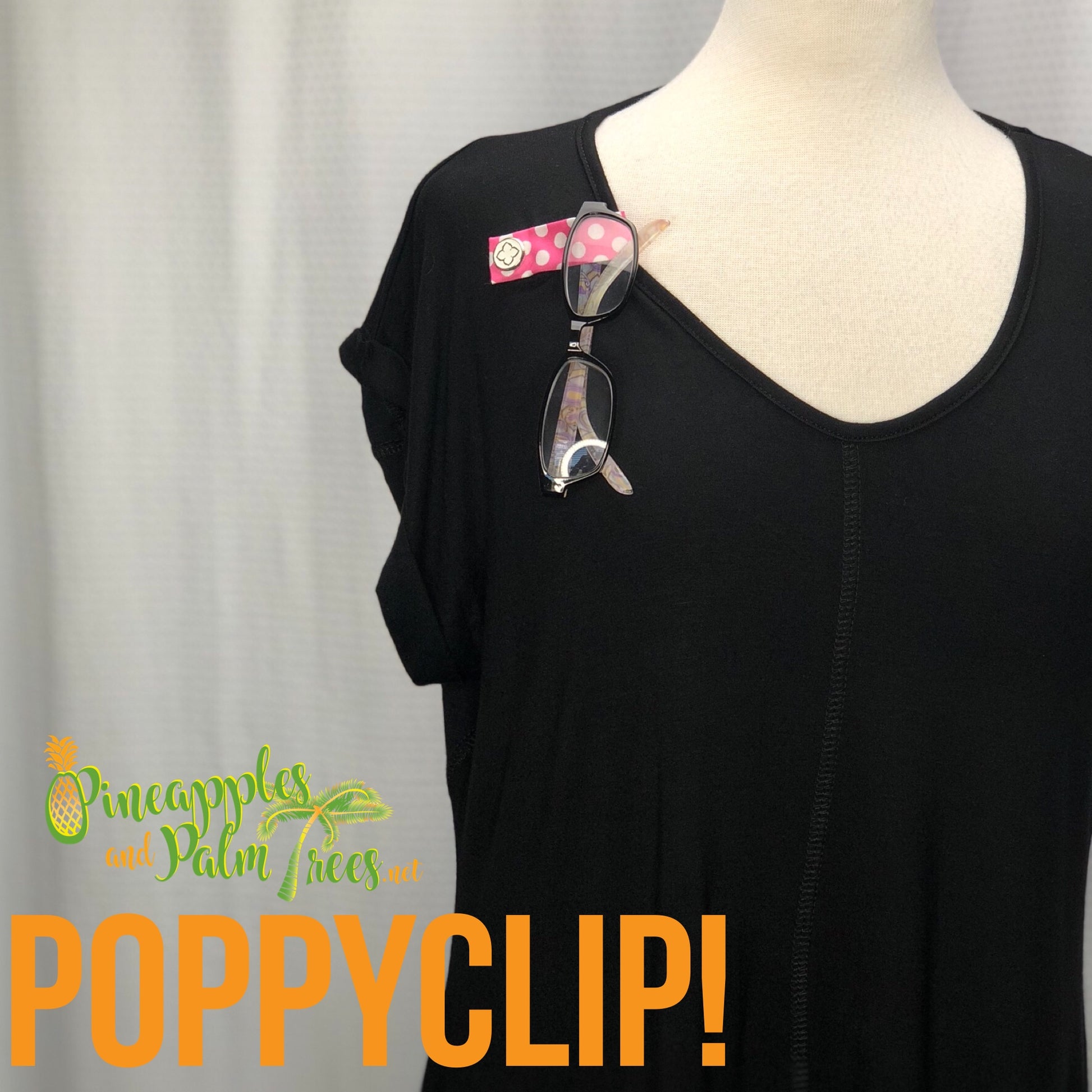 Pink PoppyClips hair accessory with polka dot design, perfect for kids or gifting.