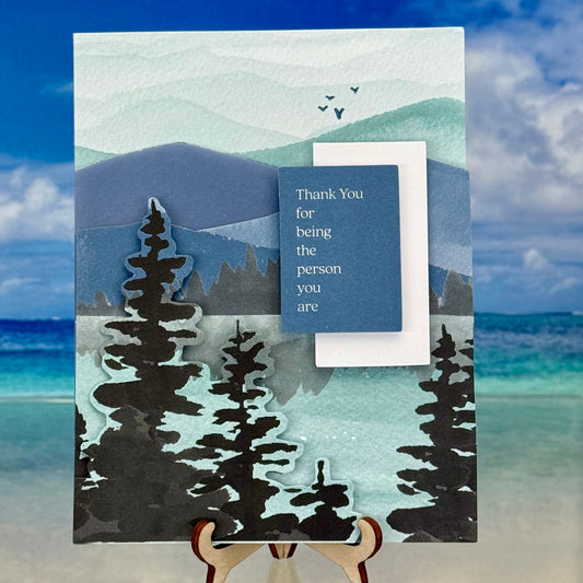 Greeting card “Thank You For Being The Person You Are” with a stylized mountain landscape on the front cover.