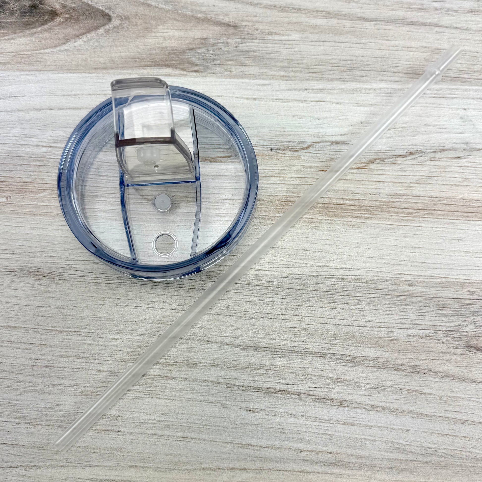 Stainless steel tumbler cover and straw for tumbler.