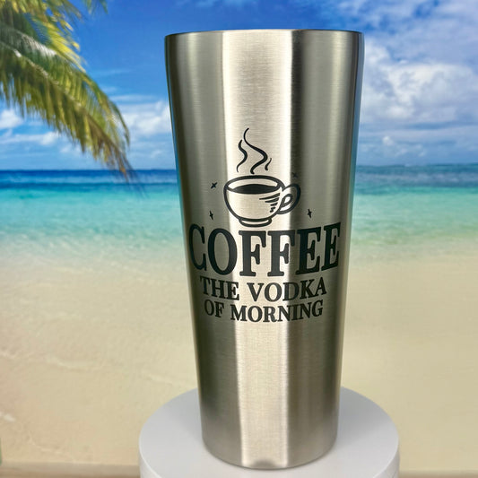 Stainless steel tumbler with “Coffee: The Vodka of Morning” humorous design on the front.